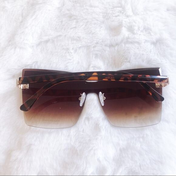 Dana Brown Rimless Oversized Cat Eye Sunglasses - Picture 9 of 9